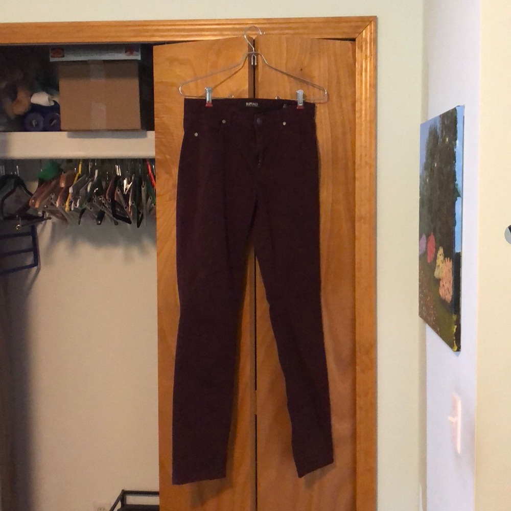 Burgundy mid-rise skinny jeans